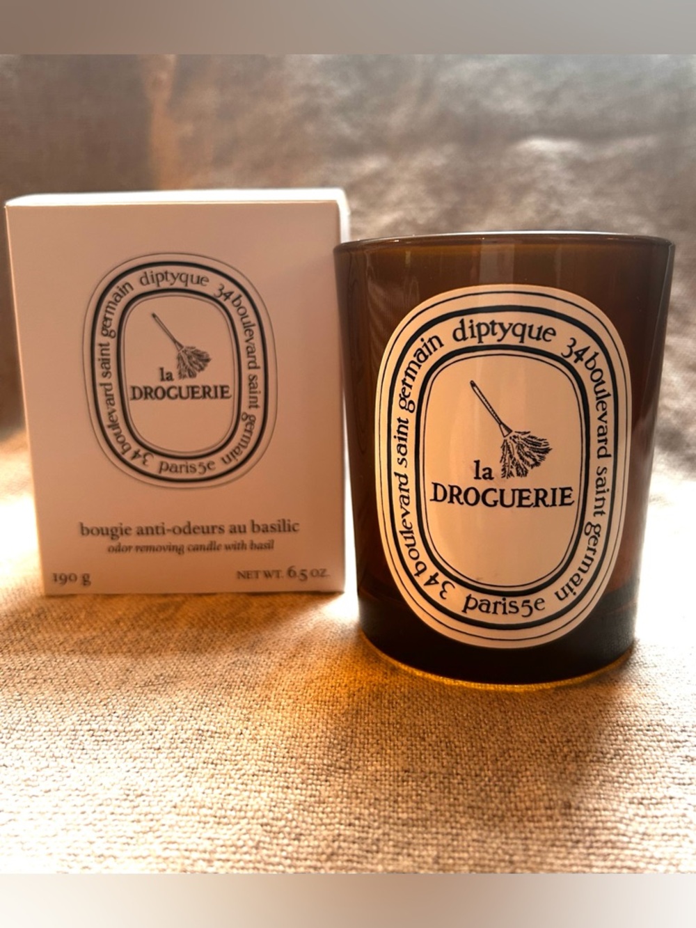 Diptyque empty La Droguerie luxury French candle vessel.